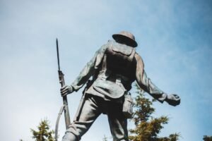 a sculpture of a soldier holding a rifle